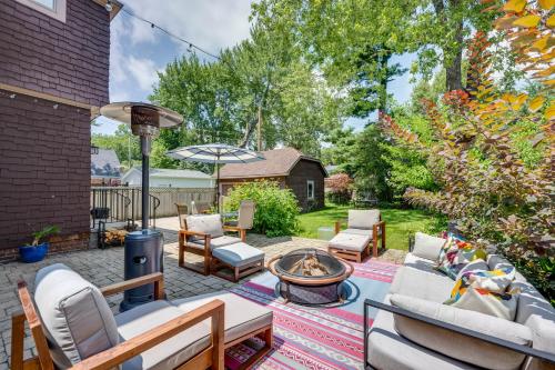 a patio with couches and a fire pit at Ferndale Gem, Walk to Stores and Restaurants! in Ferndale
