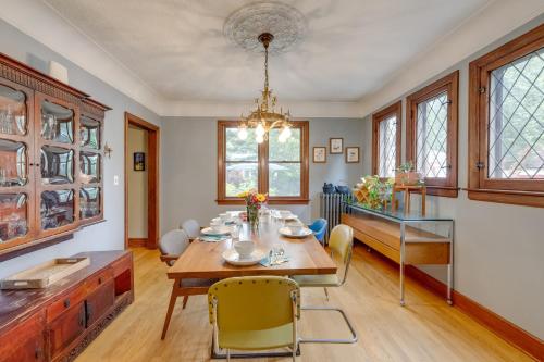 a dining room with a table and chairs and a chandelier at Ferndale Gem, Walk to Stores and Restaurants! in Ferndale