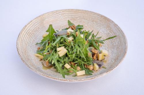 a bowl of salad with greens and cheese at Heritage Grand Perast By Rixos in Perast