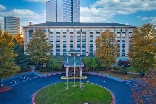 a building with a playground in front of a building at Hilton Garden Inn Atlanta Perimeter Center in Atlanta