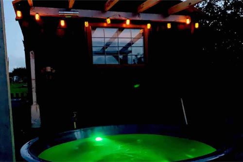 The swimming pool at or close to Cute and cosy Shepard hut with wood fuel hot tub