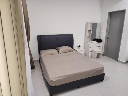 a bedroom with a bed in a white room at Netizen #MRT#Cheras#C180#3bedRooms#KLCC View#9PersonStay in Cheras