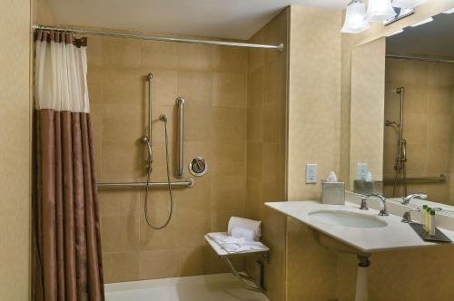 a bathroom with a sink and a shower at Doubletree by Hilton Los Angeles Downtown in Los Angeles