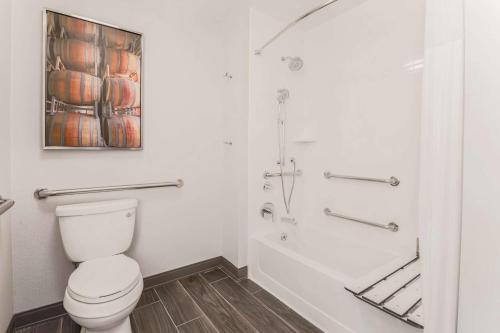a bathroom with a toilet and a shower at Hampton Inn & Suites Windsor-Sonoma Wine Country in Windsor