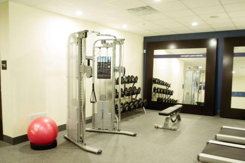 a gym with two tread machines and a red ball at Hampton Inn & Suites Tyler-South in Tyler