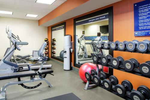 a gym with treadmills and machines in a room at Hampton Inn Merrillville in Merrillville