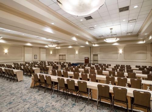 a large room with rows of tables and chairs at Hilton Garden Inn Cleveland/Twinsburg in Twinsburg