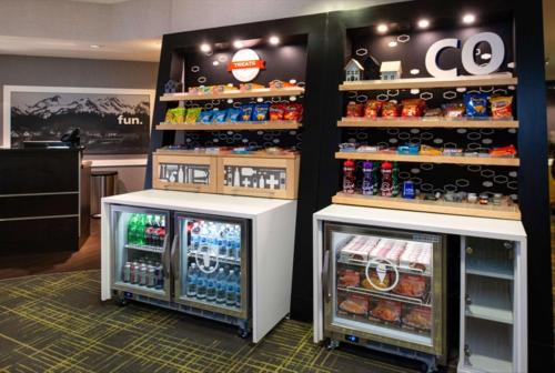 a store with two refrigerators with soda and sodas at Hampton Inn Glenwood Springs in Glenwood Springs