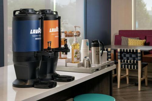 a coffee machine on a counter in a room at Tru By Hilton Denver Airport Tower Road in Denver