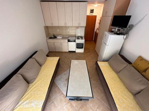 Kuchyň nebo kuchyňský kout v ubytování apartman "Sutorina"