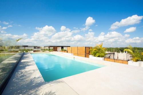 Πισίνα στο ή κοντά στο Espectacular Departamento en Aldea Zama