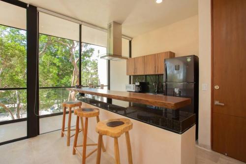 Η κουζίνα ή μικρή κουζίνα στο Espectacular Departamento en Aldea Zama