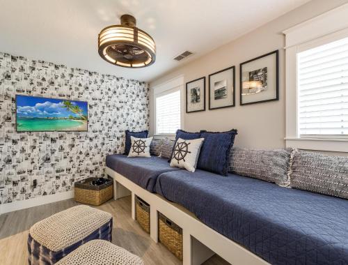 a living room with a couch and a window at Isla Amor - 86 in Siesta Key