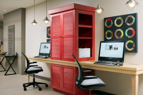 a red cabinet with a desk with a computer on it at Home2 Suites by Hilton Arundel Mills BWI Airport in Hanover