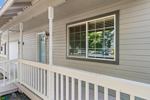 a front porch of a house with a window at Redmond Rest home in Redmond