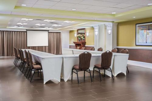 a conference room with a long table and chairs at Hampton Inn Danbury in Danbury