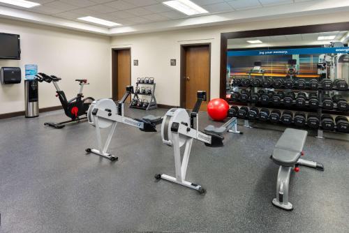 a gym with several treadmills and exercise bikes at Hampton Inn and Suites Sarasota/Lakewood Ranch in Sarasota