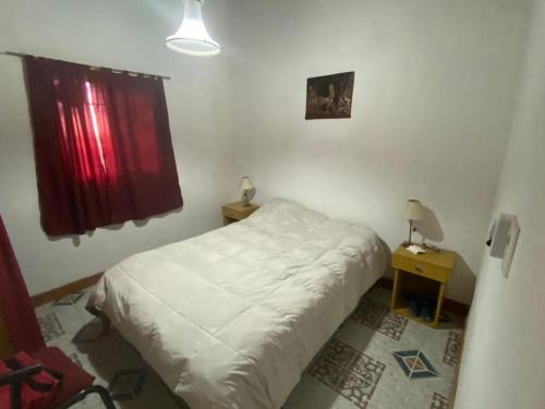 Ένα ή περισσότερα κρεβάτια σε δωμάτιο στο Cabañas la soñada de T