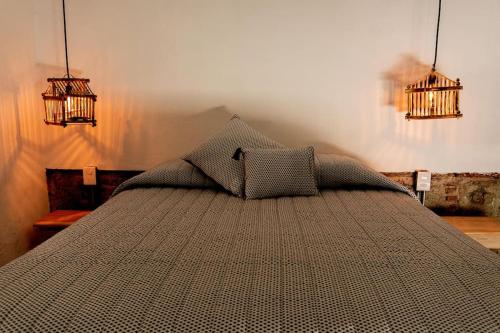 Ένα ή περισσότερα κρεβάτια σε δωμάτιο στο Guayabo estudio