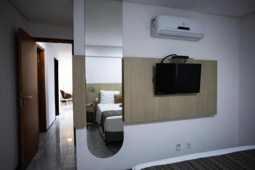Televisyen dan/atau pusat hiburan di Nobile Residences Maria Frazão