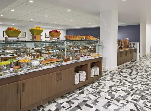 a buffet line with a lot of food on display at Doubletree By Hilton Atlanta Perimeter Dunwoody in Atlanta