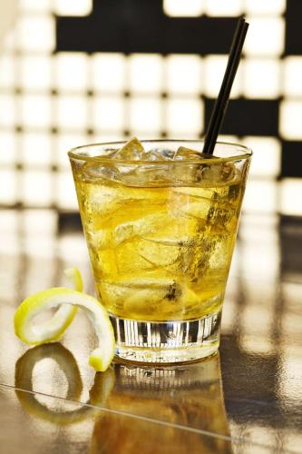 a glass of iced tea with a black straw at Doubletree By Hilton Atlanta Perimeter Dunwoody in Atlanta