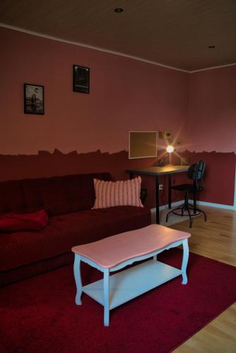 a living room with a couch and a table at KomfortZuhause in Wermelskirchen in Wermelskirchen