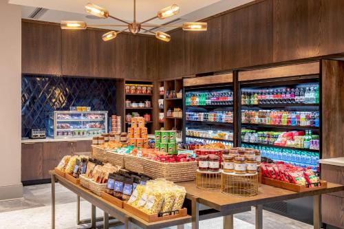 a grocery store with a large display of food at Hilton Columbus/Polaris in Columbus