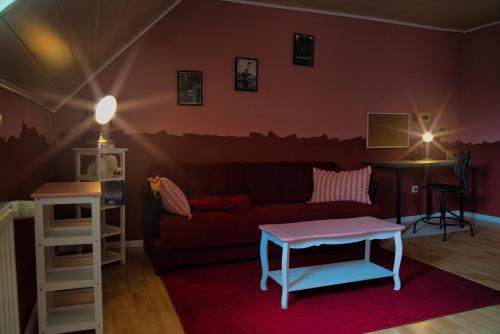 a living room with a couch and a table at KomfortZuhause in Wermelskirchen in Wermelskirchen