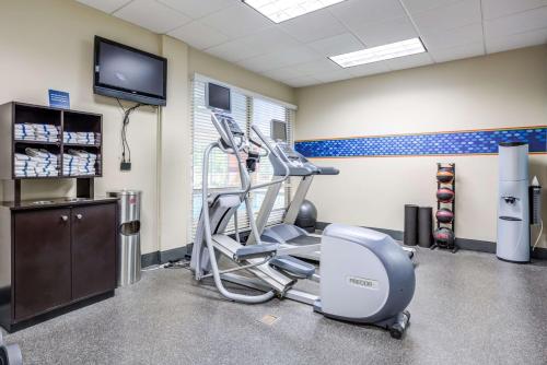 a dental room with a chair and a tv at Hampton Inn & Suites Westford-Chelmsford in Westford