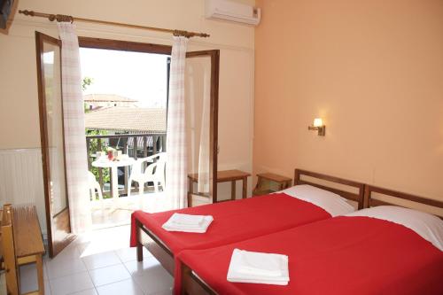 Giường trong phòng chung tại Hotel Sevilli