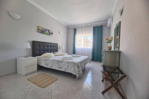 Ένα ή περισσότερα κρεβάτια σε δωμάτιο στο Cosy & Airy @ Albufeira