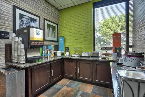 a kitchen with a counter top in a kitchen at Hampton Inn Norfolk-Naval Base in Norfolk