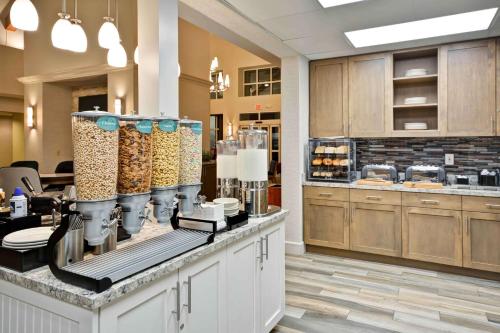 a kitchen with a counter with aasteryasteryasteryasteryasteryasteryasteryasteryastery at Homewood Suites by Hilton San Antonio Northwest in San Antonio