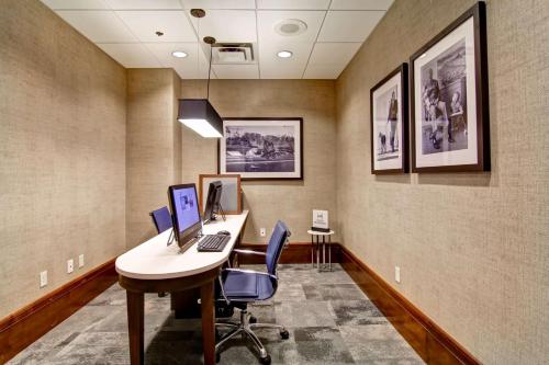 an office with a desk with two computers on it at Homewood Suites by Hilton Washington, D.C. Downtown in Washington