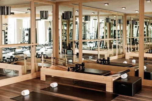 a large room with a lot of mirrors and a sink at Austin Proper Hotel, a Member of Design Hotels in Austin