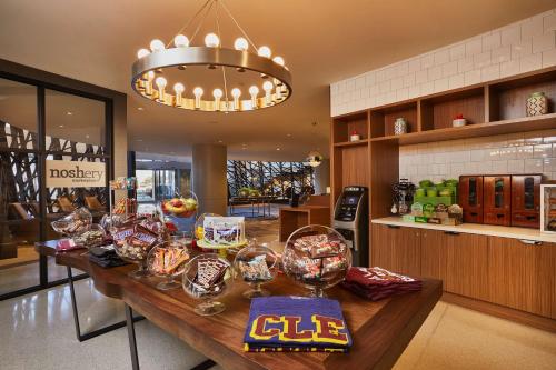 a store with a counter with food on it at Hilton Cleveland Downtown in Cleveland