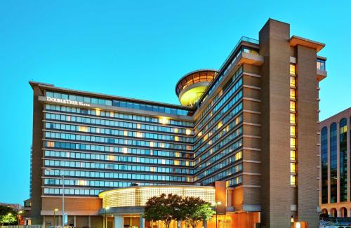 a building with a clock tower on top of it at DoubleTree by Hilton Washington DC – Crystal City in Arlington