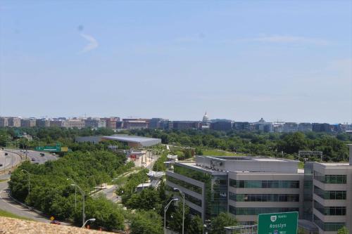 a view of a city with a building and a street at DoubleTree by Hilton Washington DC – Crystal City in Arlington