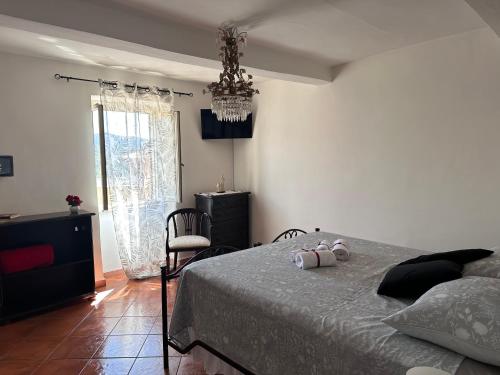 Postel nebo postele na pokoji v ubytování Vicolo Santa Maria- Appartamento nel centro storico.