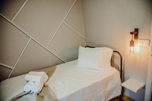 Postel nebo postele na pokoji v ubytování Quinta Dos Avós Lourenço