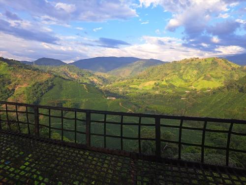 a view of a valley in the mountains at Finca Campestre Villa del Campo in Santa Rosa de Cabal