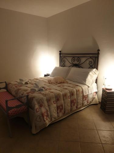 Llit o llits en una habitació de Appartamento I Tulipani. Camera I Tulipani Rossi