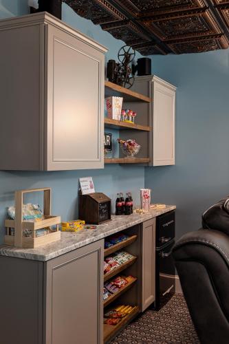 a room with a counter with food and a chair at Pillow and Paddock B&B in La Grange