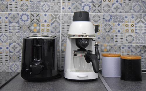 Kemudahan buat kopi dan teh di Impressive Târgu Ocna