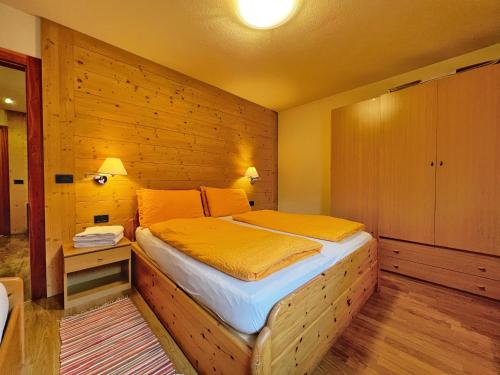Postel nebo postele na pokoji v ubytování Garni Francescato