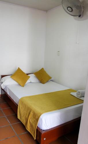 Hotel Colonial San Felipeにあるベッド