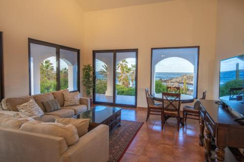 a living room with a couch and a table at Rancho Las Cruces in Las Cruces