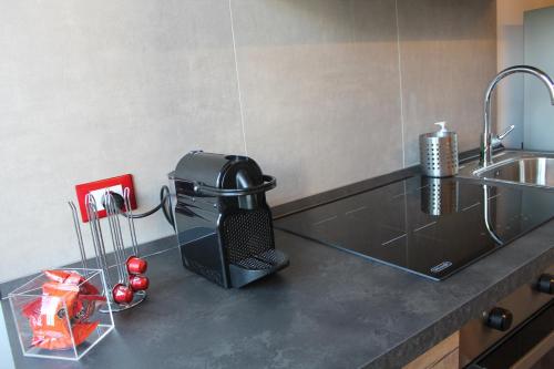 A kitchen or kitchenette at Mondello Apartment