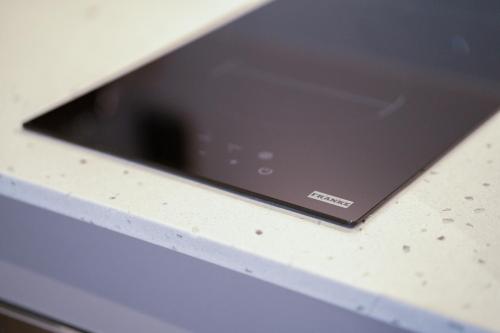 a laptop computer sitting on top of a counter at TWENTY SIX ANFA LUXURY RESIDENCE by Shortstaymaroc -Hyper Centre -Parking in Casablanca
